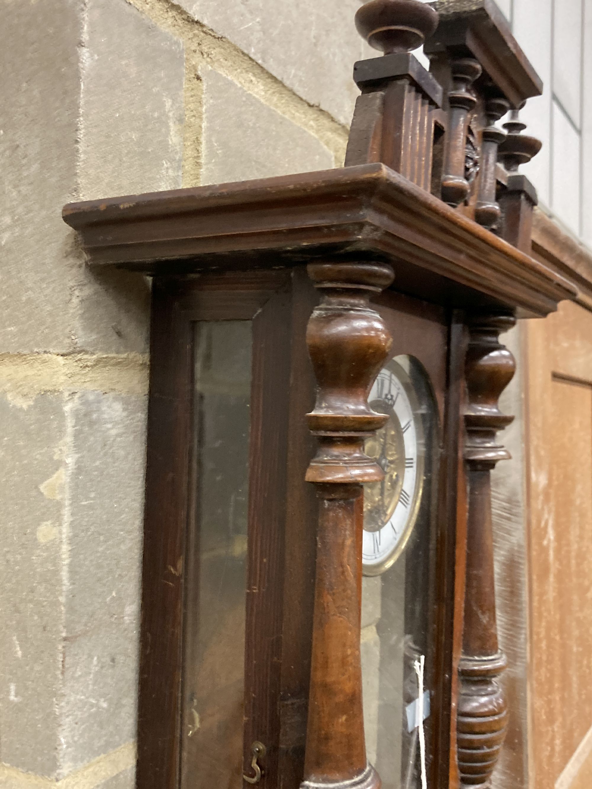 A 19th century Vienna type wall clock with musical chime, height 84cm